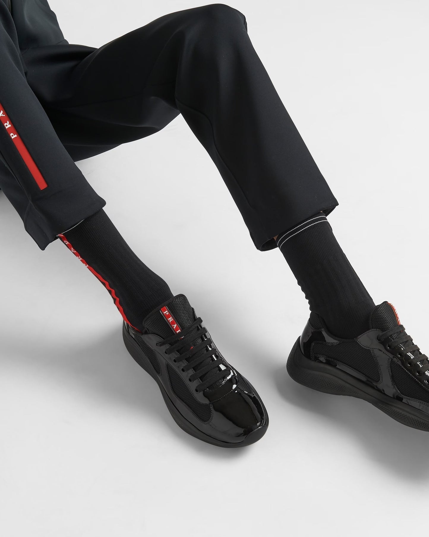 Prada Sneakers America’s Cup en cuir verni et tissu technique