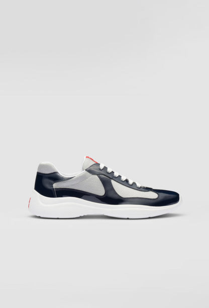 Prada Sneakers America’s Cup en cuir verni et tissu technique